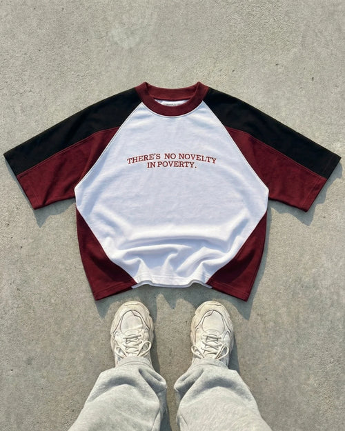 NO NOVELTY IN POVERTY TEE