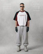 NO NOVELTY IN POVERTY TEE