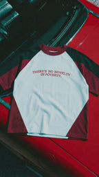 NO NOVELTY IN POVERTY TEE
